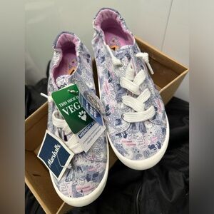 Brand new Skechers with tags never worn size 7 cat print very cute